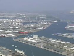 WS AERIAL ZI ZO PAN View of industrial area at Antwerp Docks / Flemish Region, Belgium Stock Footage