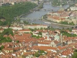 WS AERIAL TU View of city with bridge over river / Prague, Czech Republic Stock Footage