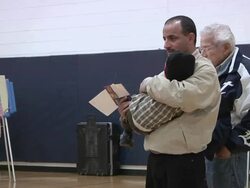 November 2, 2010 PAN Voters from the Arab community waiting in line to receive their ballots / Dearborn, Michigan, United States Stock Footage