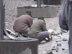 Workers Laying Cobble Stones Stock Footage