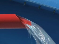 Water jet from red tube; game attraction detail in waterpark Stock Footage