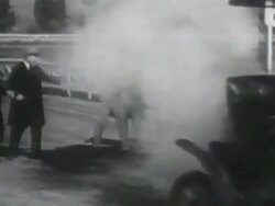 1900s B/W MONTAGE Man in his car races horse and buggy / United States Stock Footage