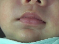 Infant mouth close-up Stock Footage