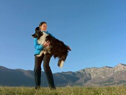 HD Super Slow-Mo: Border Collie Jumping Into Arms Stock Footage