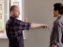 MS Woman consulting contractor about renovating home / Berlin, Germany Stock Footage