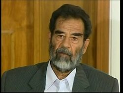 WRAP Defiant Saddam Hussein appears in court for first time Instructional Video