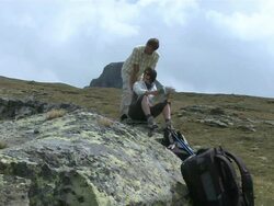 MS Hikers searching road in map at Riffelberg / Zermatt, Valais, Switzerland Stock Footage