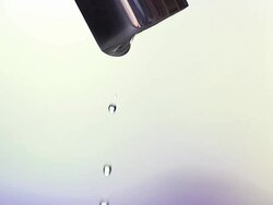 CU SLO MO Drops of water falling on washbowl / Vieux Pont en Auge, Normandy, France Stock Footage