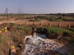 Gold mining causing acid pollution to water News Clip