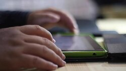 man writing with on touchscreen device Stock Footage