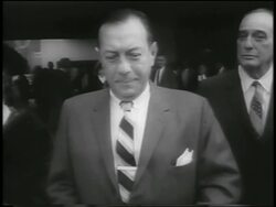 B/W 1959 tilt down Mayor Robert Wagner cutting ribbon at Guggenheim Museum dedication / NYC Stock Footage