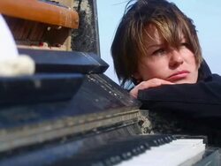 thoughtful young woman and an old piano Stock Footage