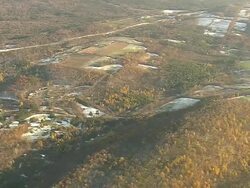 MS AERIAL Shot of falled snow through trees with mountain / Vermont, United States Stock Footage