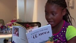 VOICED : Michelle una escritora sudafrican de 7 anos News Clip