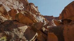 Wide low angle shot of rock formation landscape / Moab, Utah, United States Stock Footage