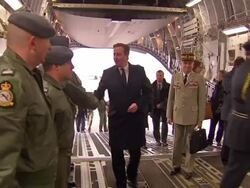Hollande and Cameron Meeting Military Personnel On RAF Plane News Clip