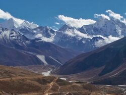 Time-lapse of clouds passing over a Himalayan valley. Cropped. Stock Footage