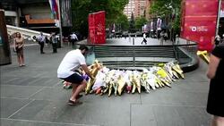 CLEAN : Well wishers leave flowers at scene of Sydney siege News Clip