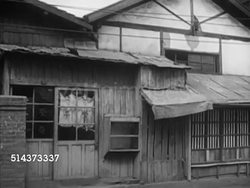 1950: KOREAN CONFLICT (WAR): MS Unidentified village building, CU MS Door w/ metal lock, WS Deserted village w/ winding dirt road.   Cold War, Civil War. Instructional Video