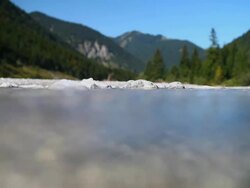 HD Surface level view of a mountain river Stock Footage