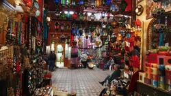Shoppers maneuver through the Souq in Marrakech, Morocco. Stock Footage