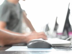 people use computer to search books in library Stock Footage