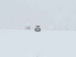 HD: Tractor in snowfall Stock Footage