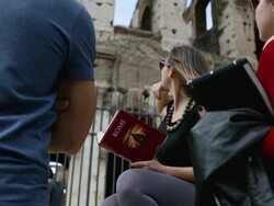 Tourists with a guide in front of the Coliseum, Rome Stock Footage