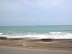 WS POV side View from car of roads and sea / South Of Peru, Nazca, Peru Stock Footage