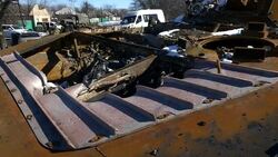 Destroyed BMP type military vehicle at roadside News Clip