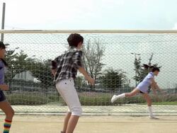 MS SLO MO Shot of Boy and Girls playing soccer / Seoul, South Korea Stock Footage