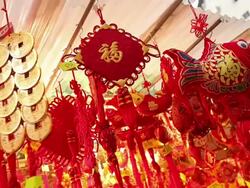 CU Shot of Gifts hanging for sale at market / Hong Kong, China Stock Footage