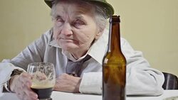 Drunk elderly woman Stock Footage