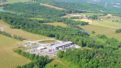 WS AERIAL Fracking Drill Rig near farmland / Pennsylvania, United States Stock Footage