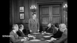 1950: CITY GOVERNMENT: Sign 'Council Chamber' DRAMATIZATION: Civic Leaders, City Council Members, Community Civil Servants, adult males sitting at table in meeting, one man smoking cigar, another gesturing w/ pencil toward man standing. Instructional Video