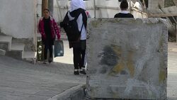 Palestinian children passing separation barrier News Clip