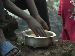 Woman preparing manioc  Stock Footage