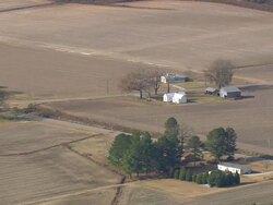 MS AERIAL ZI View of house in field / North Carolina, United States Stock Footage