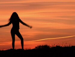HD: Woman Enjoying At Sunset Stock Footage