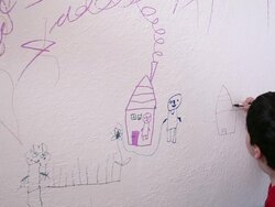 Child drawing wall Stock Footage