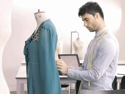 Male Fashion Designer working in studio Stock Footage