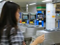 Woman Validating The Ticket Stock Footage