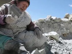 MS LA Shot of woman working in mine / Potosi, Bolivia Stock Footage