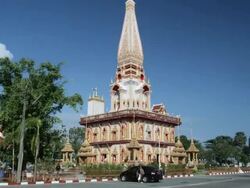 The Phramahathat Chedi (Great Relic Stupa) at Wat Chalong, Phuket, Thailand Stock Footage