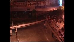 Car set alight as pro and anti-Morsi supporters battle near Tahrir Square News Clip