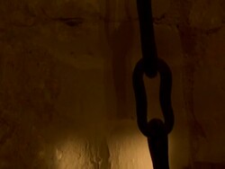 CU PAN Chains in dungeon / Loire Valley, France Stock Footage
