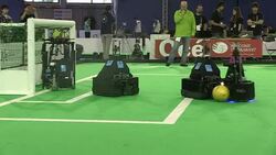 CLEAN : Robot footballes kick off their world cup News Clip