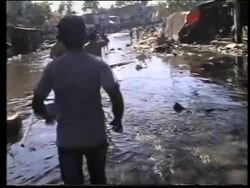 Bodies and devastation following tsunami News Clip