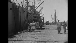 Iranian dock workers unload Lend-Lease goods from US to Soviet Union at Iranian port News Clip