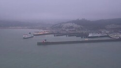 Aerials of Dover Cliffs & Castle in Foggy Weather News Clip